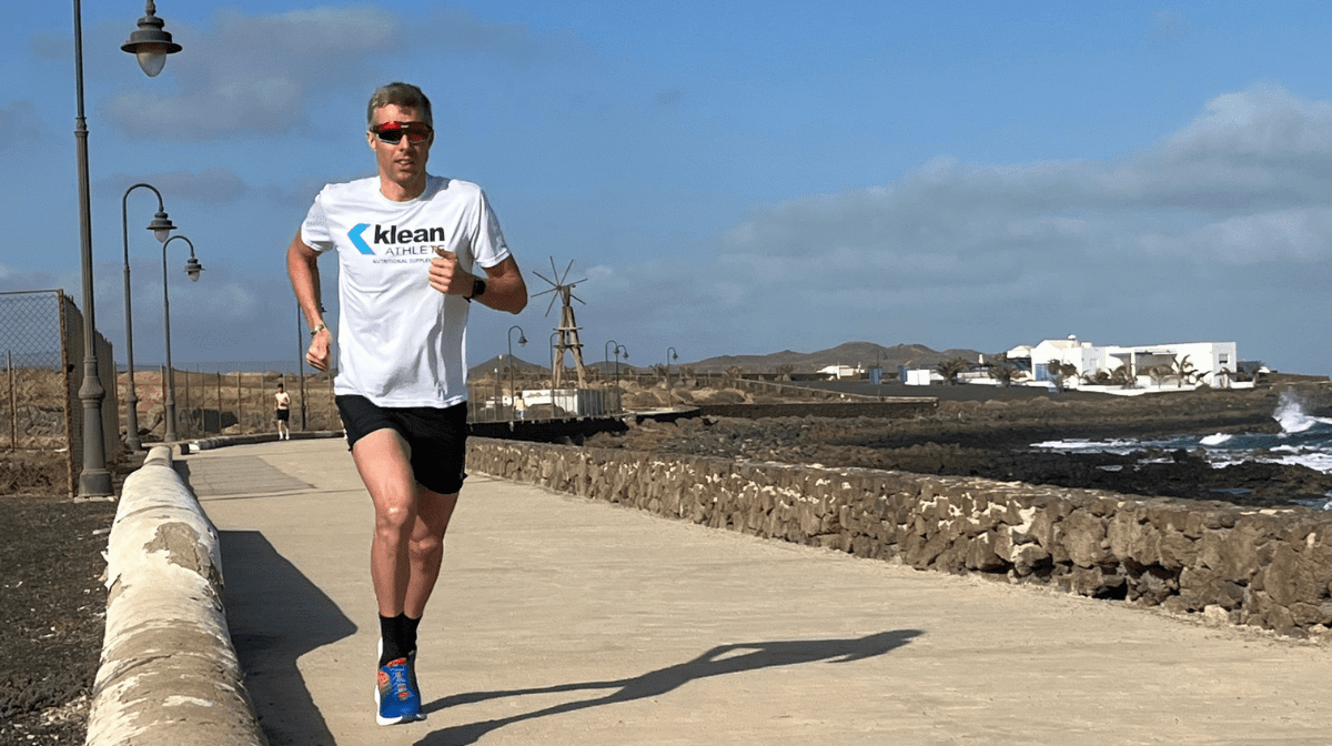 klean athlete running on footpath