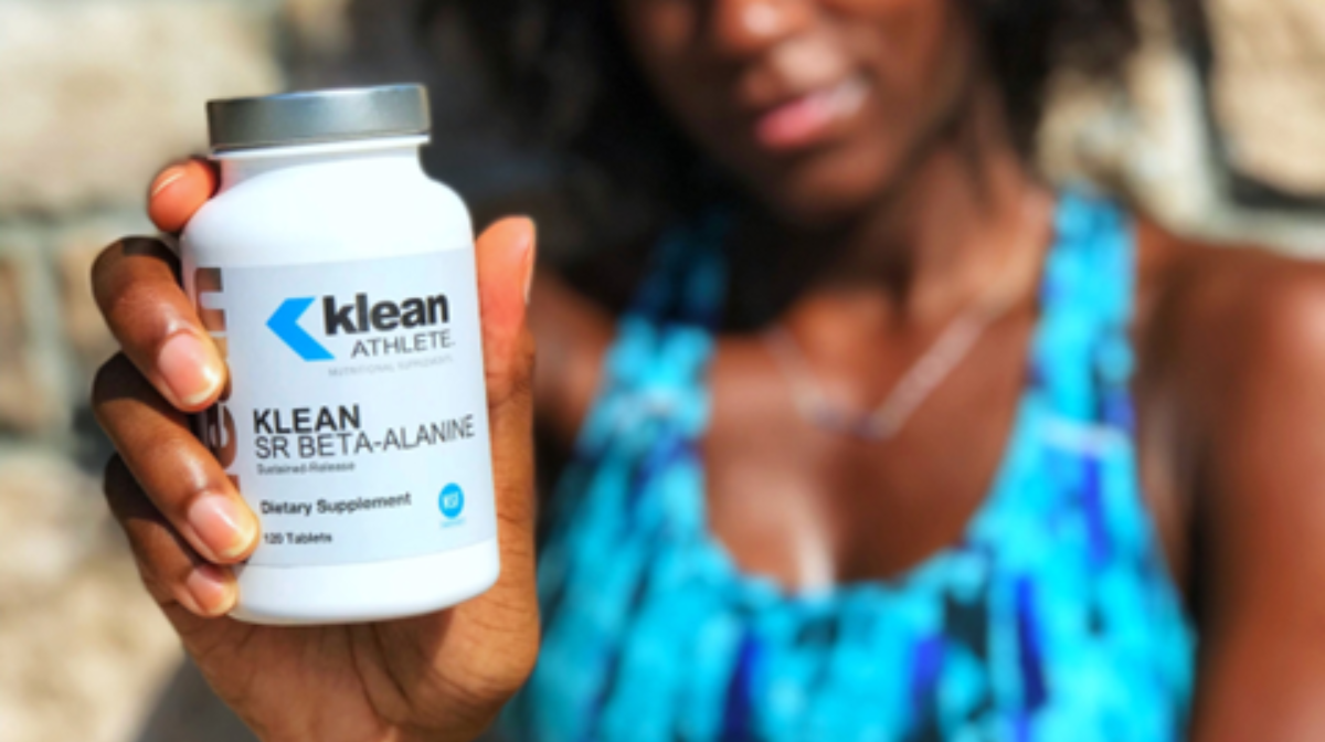 women holding Klean SR Beta-Alanine