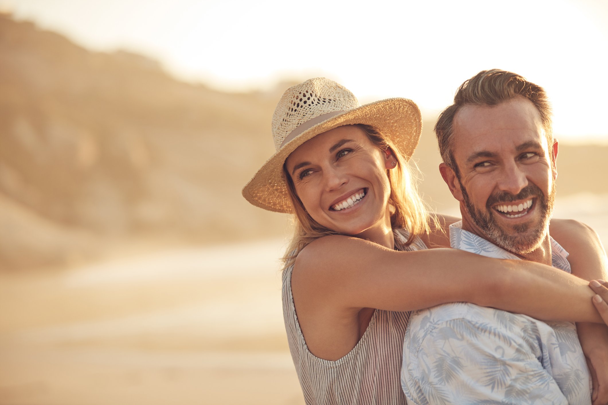 Happy couple by the sea