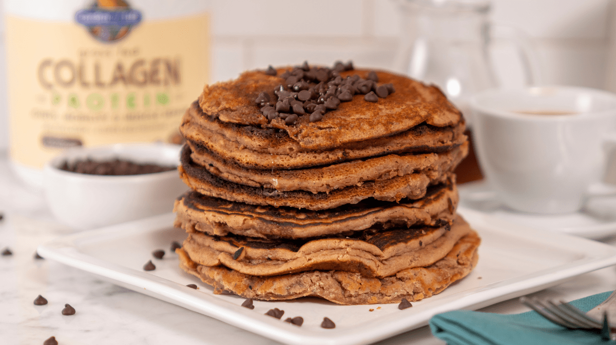 chocolate collagen pancakes stacked on a plate