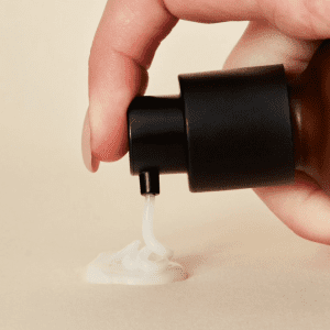 hyaluronic acid being squeezed out of bottle