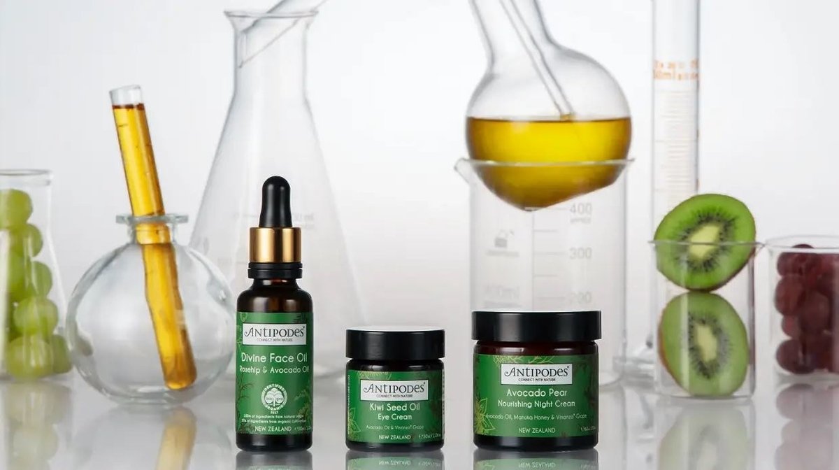 sustainable skincare products next to scientific equipment