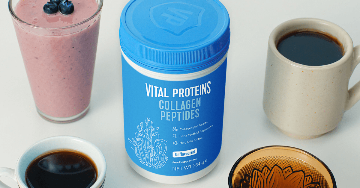 Vital Proteins Collagen Peptide Powder on a table with smoothies and coffees surrounding it