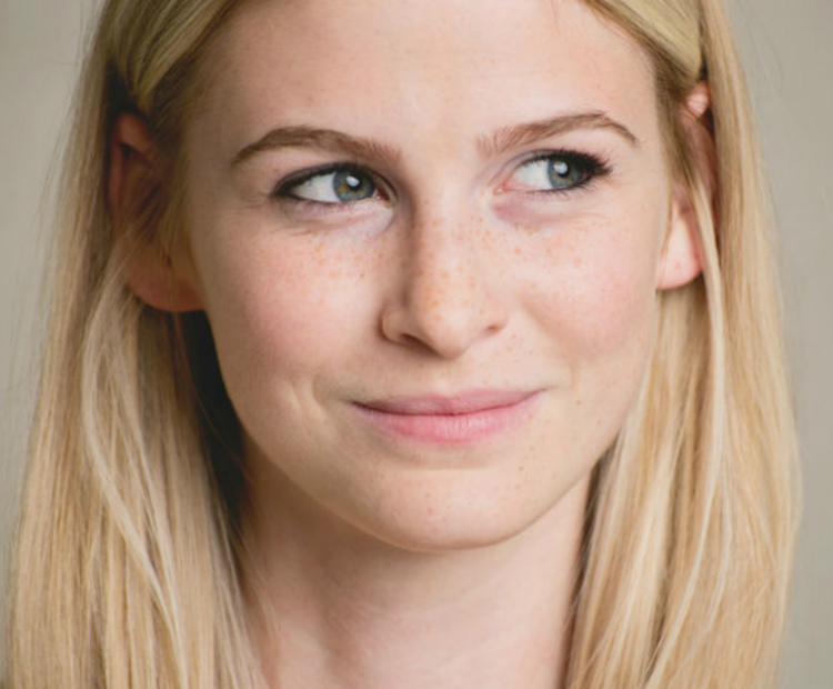 blonde woman with freckles