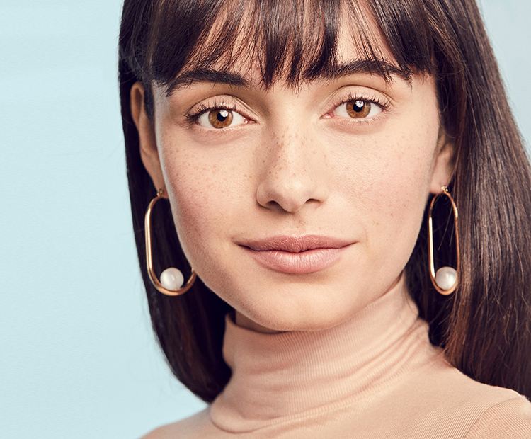 Dark-haired model with freckles