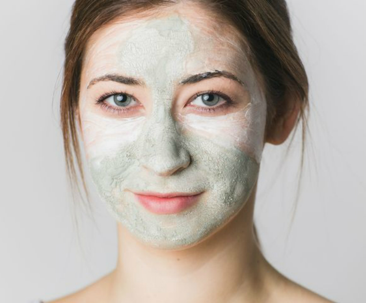 woman using a face mask