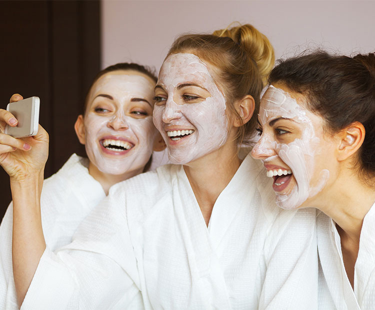 Women applying face mask 1