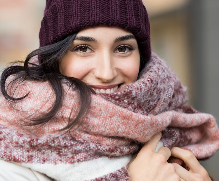 Woman wearing scarf and beanie 1