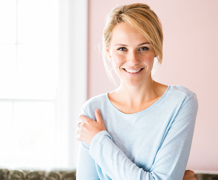 Portrait-of-a-woman-at-home-on-a-pink-background-1 | Dermstore Blog