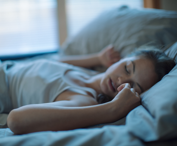 woman sleeping in bed