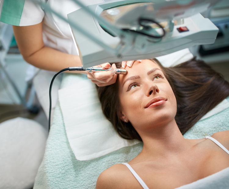 woman getting a cosmetic treatment