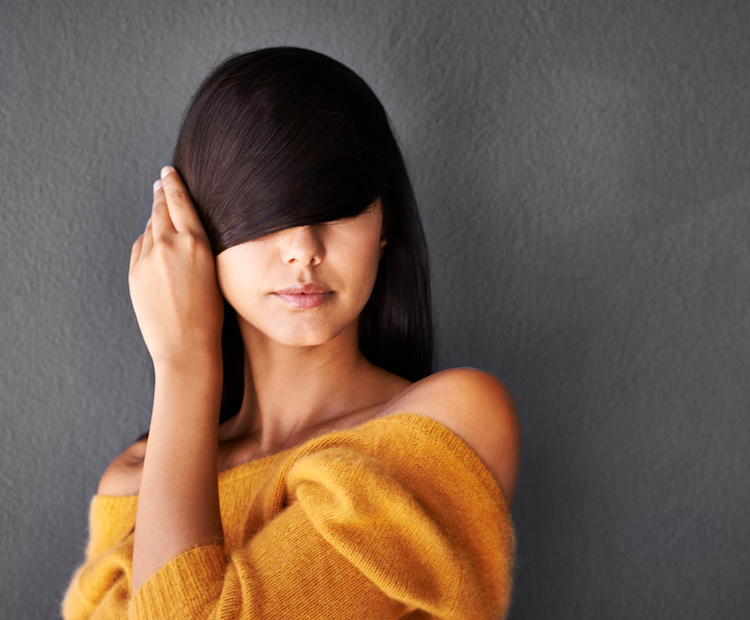 woman with hair in front of face