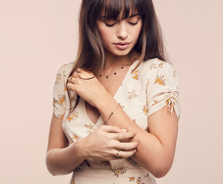 model touching arm 