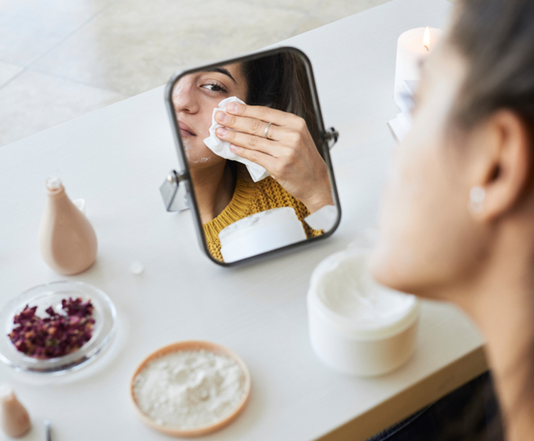 woman wiping face