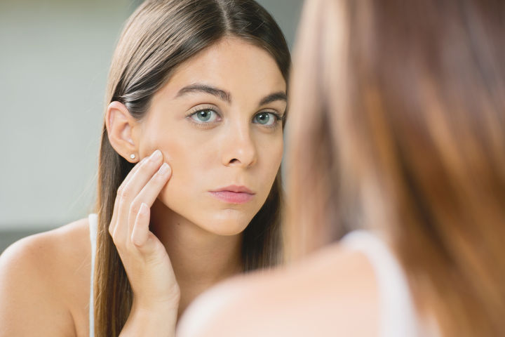 woman with facial redness