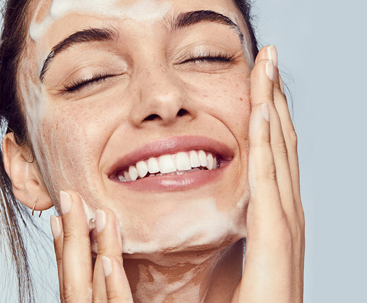 Woman washing her face 1 