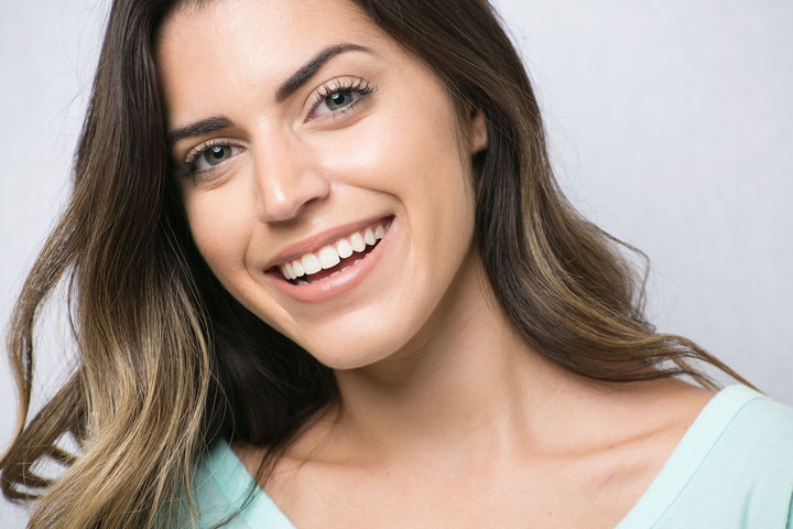 brunette woman smiling