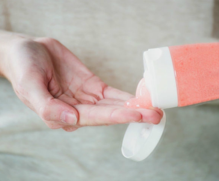 Exfoliating scrub in woman's hand