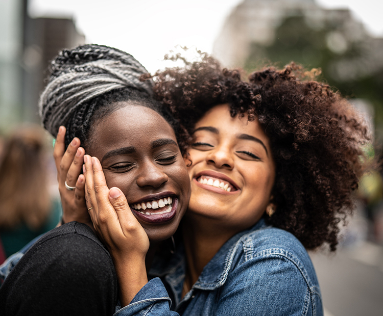 Two women smiling