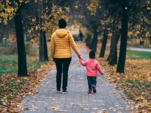 Parent and child walking