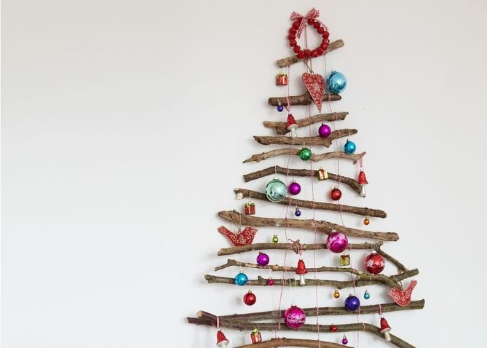 zero waste DIY christmas tree made of twigs and old baubles