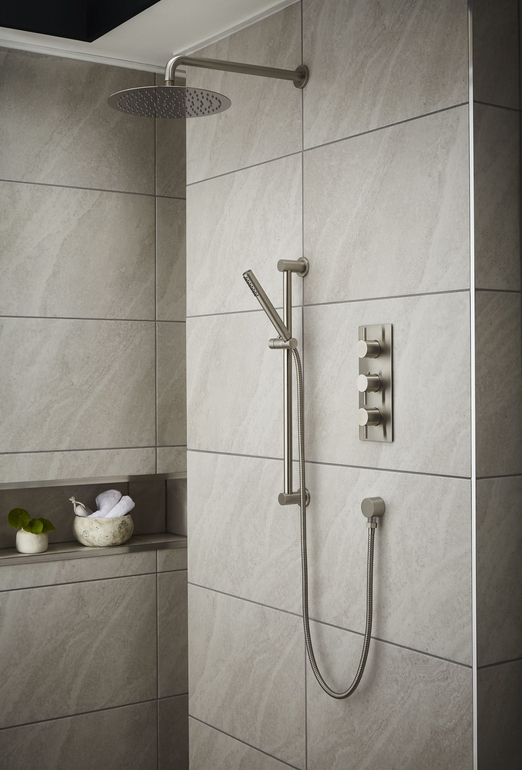 an image of a shower riser rail fitted in a shower