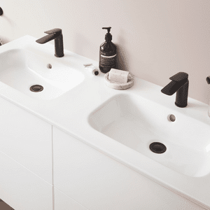 an image of a close up of a double white bathroom sink