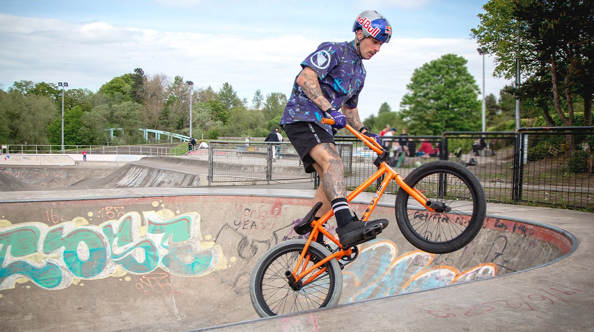 BMX rider jumps from halfpipe
