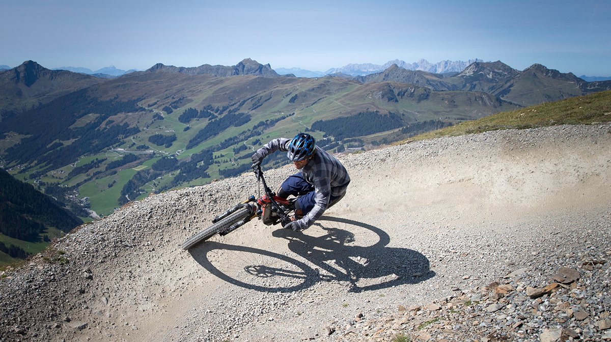 cyclist going fast around a bend