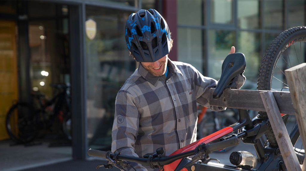 Man stares at bike lovingly