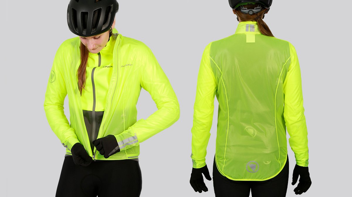 Lady zips up yellow Endura jacket