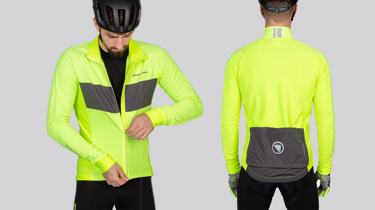 Man zips up yellow Endura waterproof