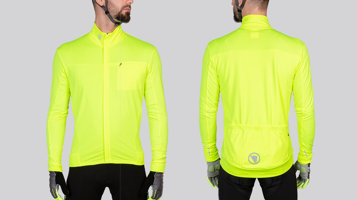Person stands in fully zipped Endura high viz jacket