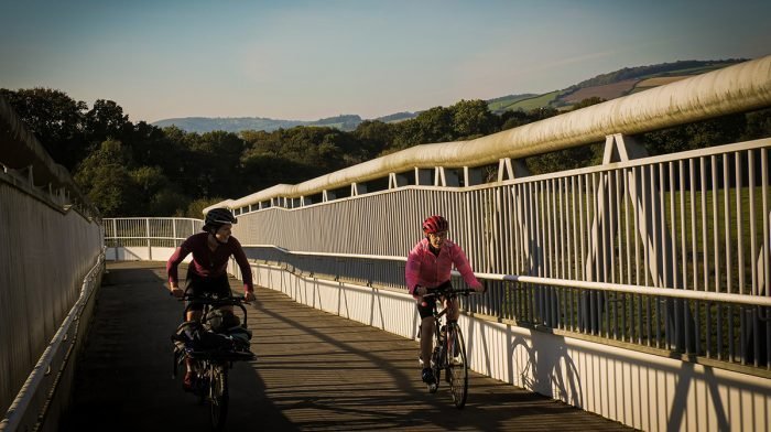 Endura cyclists head along bridge