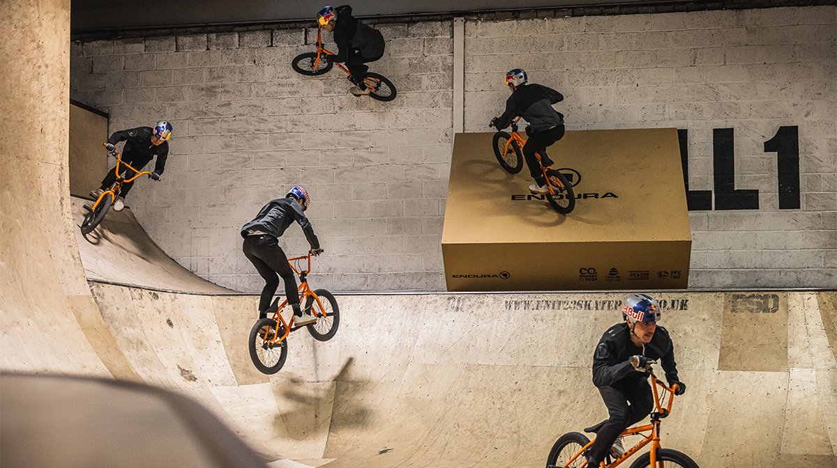 Endura mountain bikers perform lap of the halfpipe