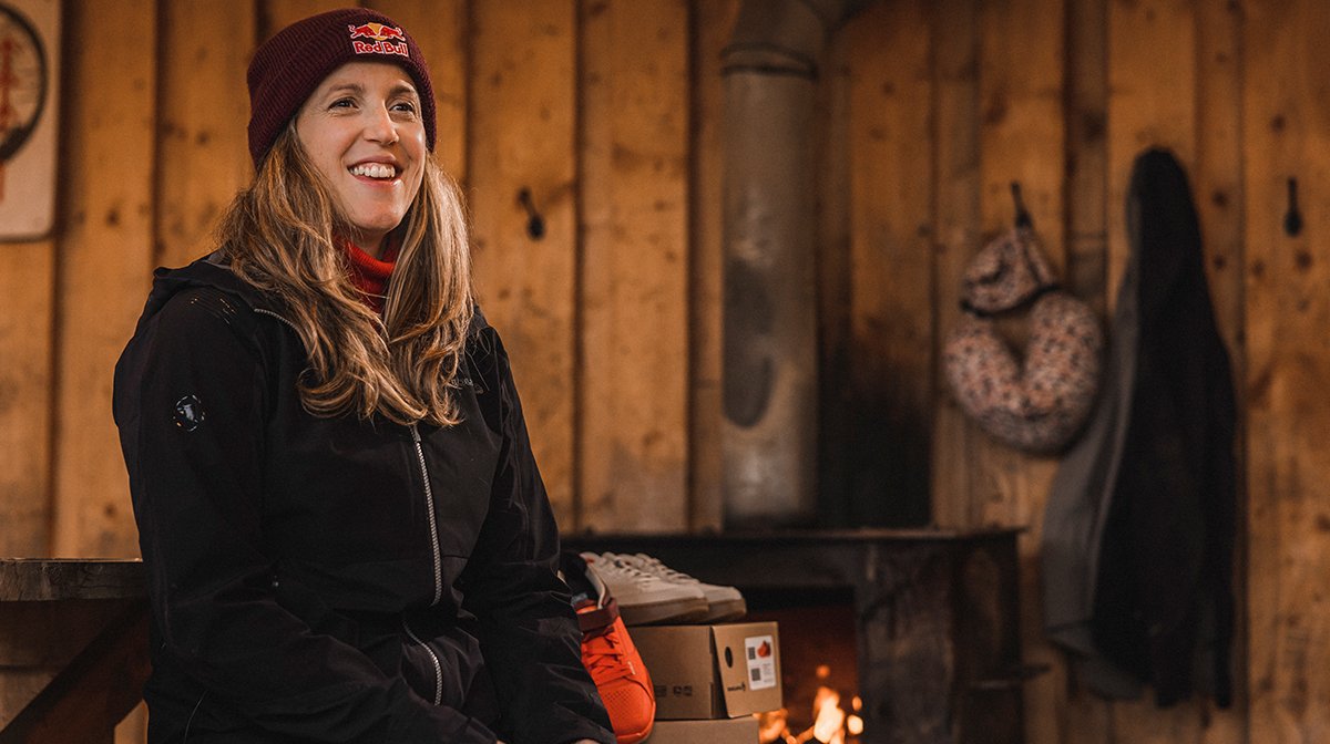 Lady smiles while wearing Endura mountain biking top and hat