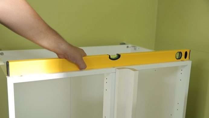 How to Install Cabinets into a Corner