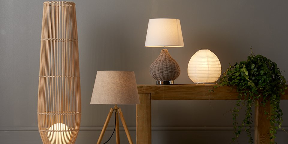 Four different lamp shades, varying in style and size