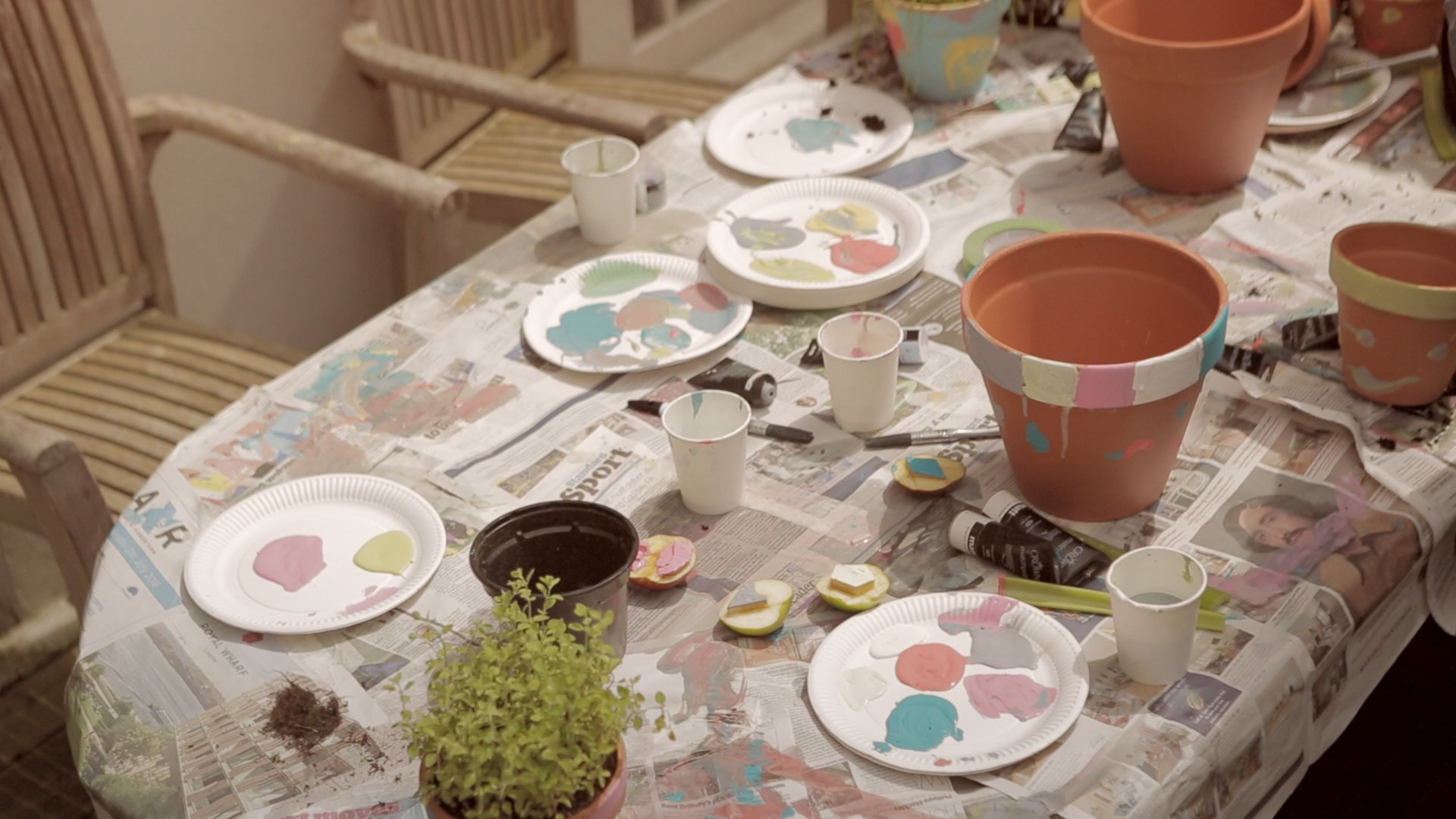 table with kids painting materials
