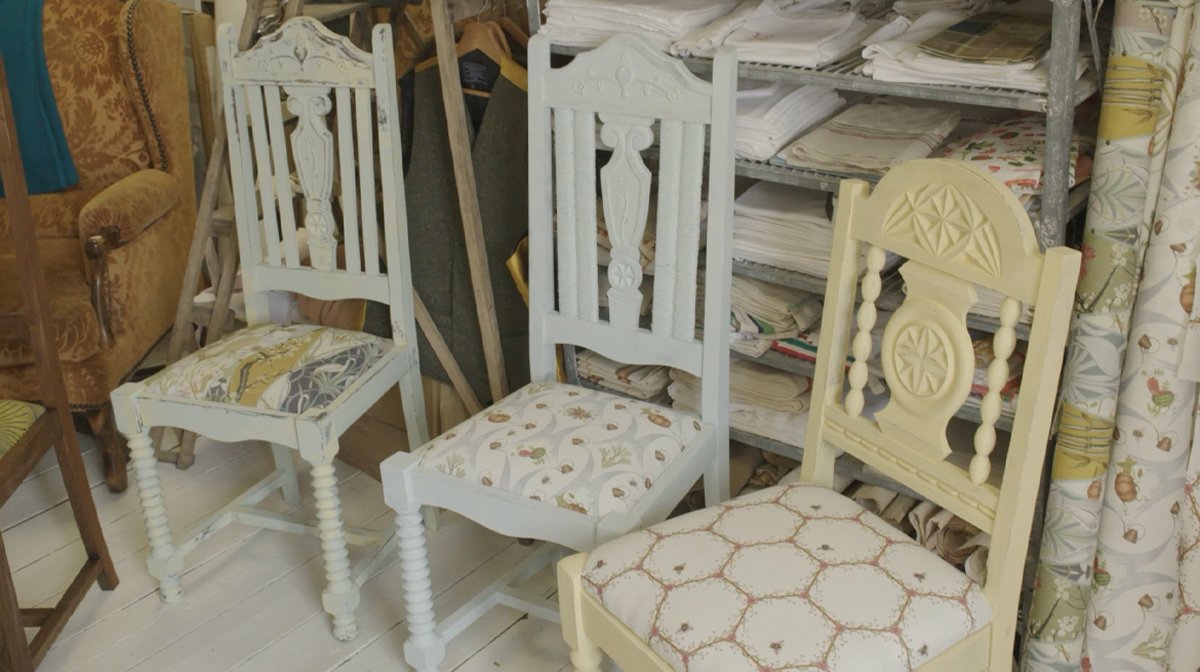 three wooden upcycled chairs