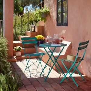 an image of a green outdoor bistro set 