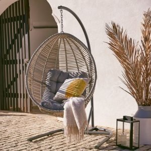 an image of a rattan swinging chair