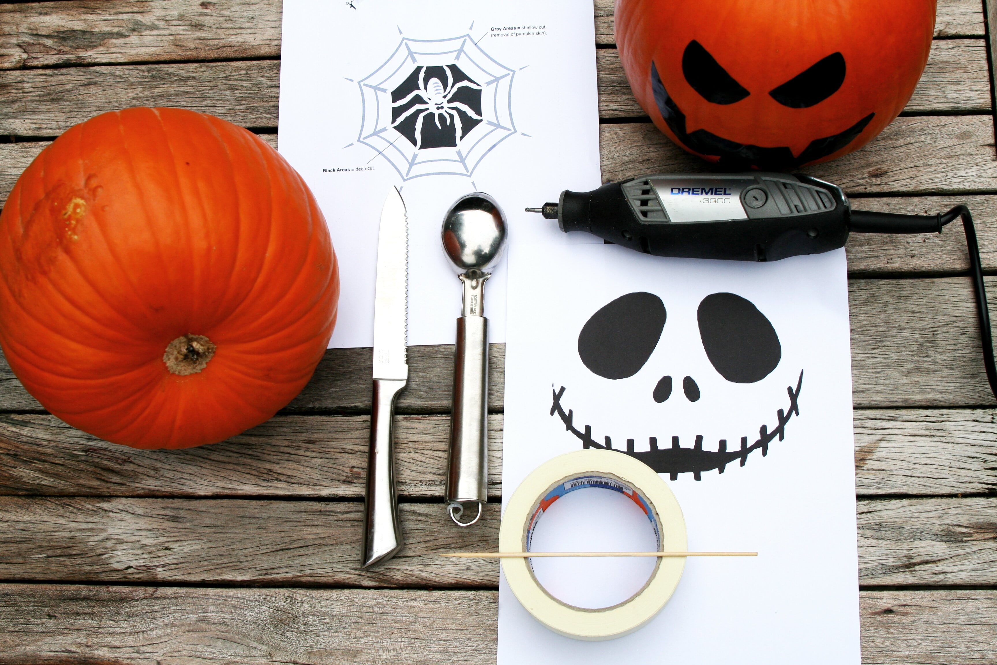 an image of a pumpkin and pumpkin carving tools