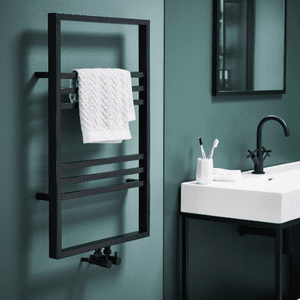 image of a black heated radiator in a small blue bathroom 