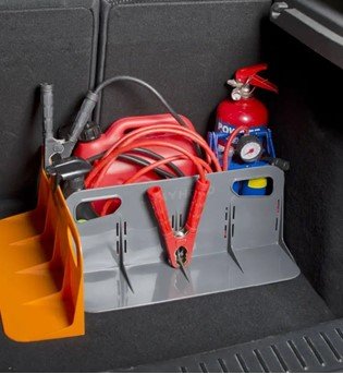 an image of a cargo holder in the back of a car with essentials in 