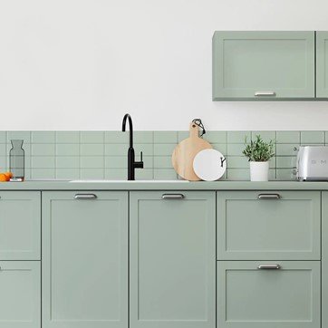 an image of sage green painted kitchen cabinets 