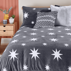 an image of charcoal fleece bedding with white stars on 