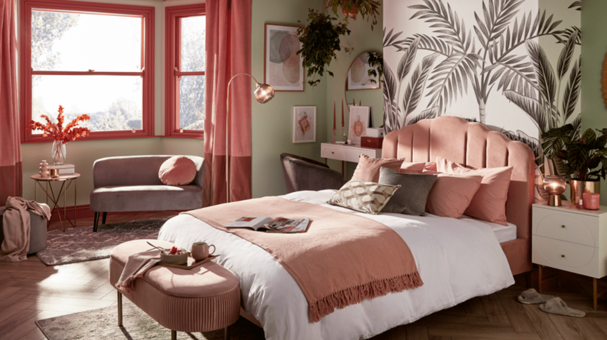Modern pink bedroom with feature wall wallpaper