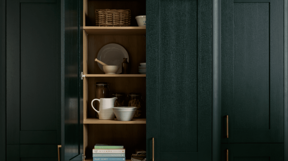Modern wooden kitchen cupboard, deep blue colour
