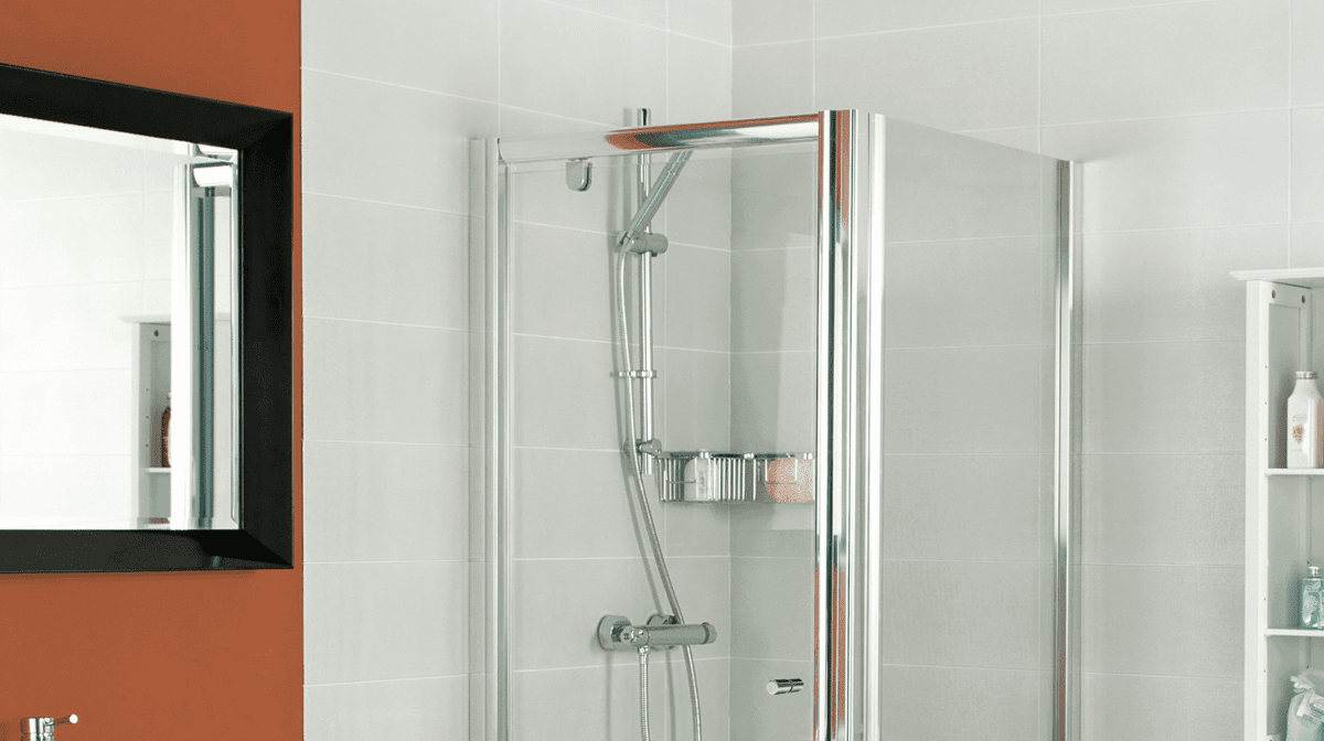 Image of a silver shower unit in a grey bathroom